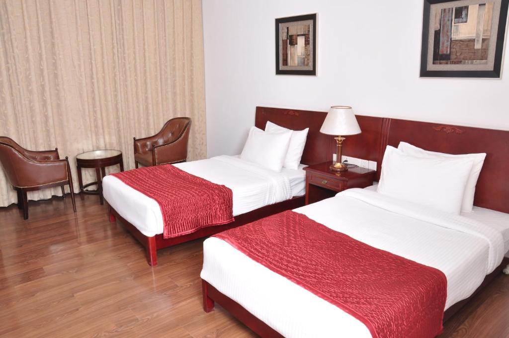 Lilywhite Hotel Nueva Delhi Habitación foto